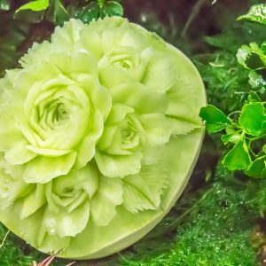 Cantaloupe fruit carving in the garden on table sets.